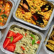Fresh group meal trays prepared for students as part of scheduled activities and day programs.