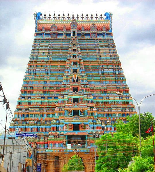 Rockfort Temple tower in Trichy featuring a tall stone structure and bright decorative elements.